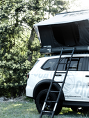Lucas Creek D-luxe tent open on the vehicle showing the top quality easy step Lucas Creek 2.3 m telescopic ladder