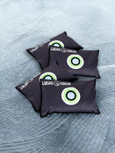 4 reusable anti condensation bags sitting in a tent 