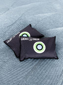 Two reusable anti condensation bags sitting in a tent 